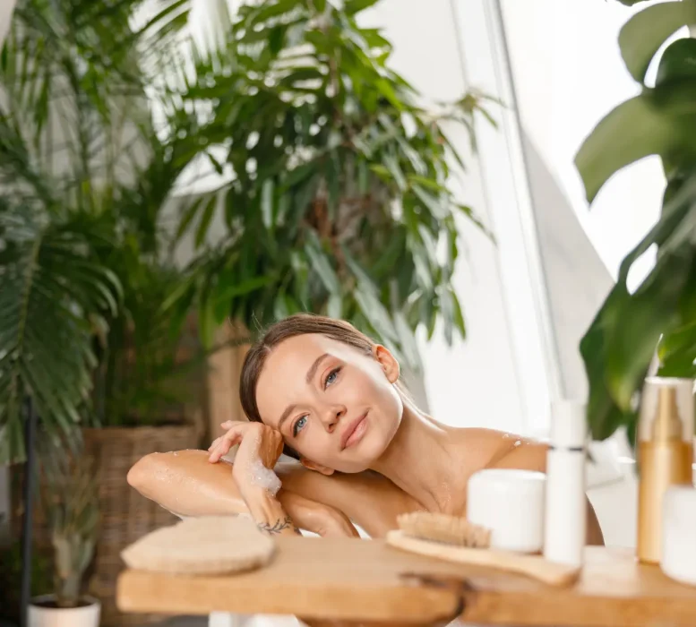 peaceful-young-woman-looking-at-camera-while-takin-2024-10-18-08-15-55-utc